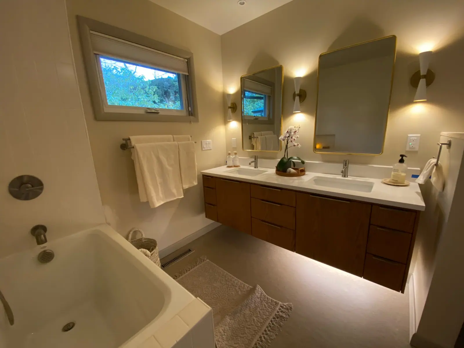 Bathroom with a double vanity and soaking tub